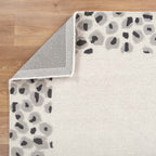 Le Canvas Kova — Cream grey rug, showing rug back weave and edge finish