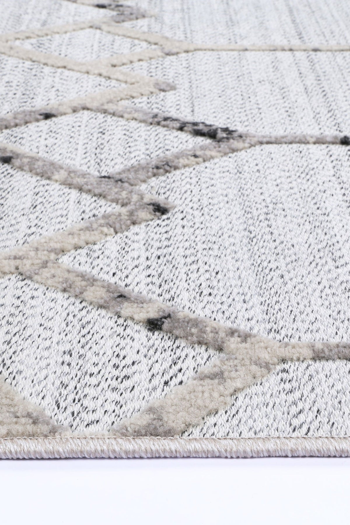 Le Canvas Helia — Cream and taupe rug, pile texture