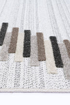 Le Canvas Ione — Stone and grey rug, pile texture