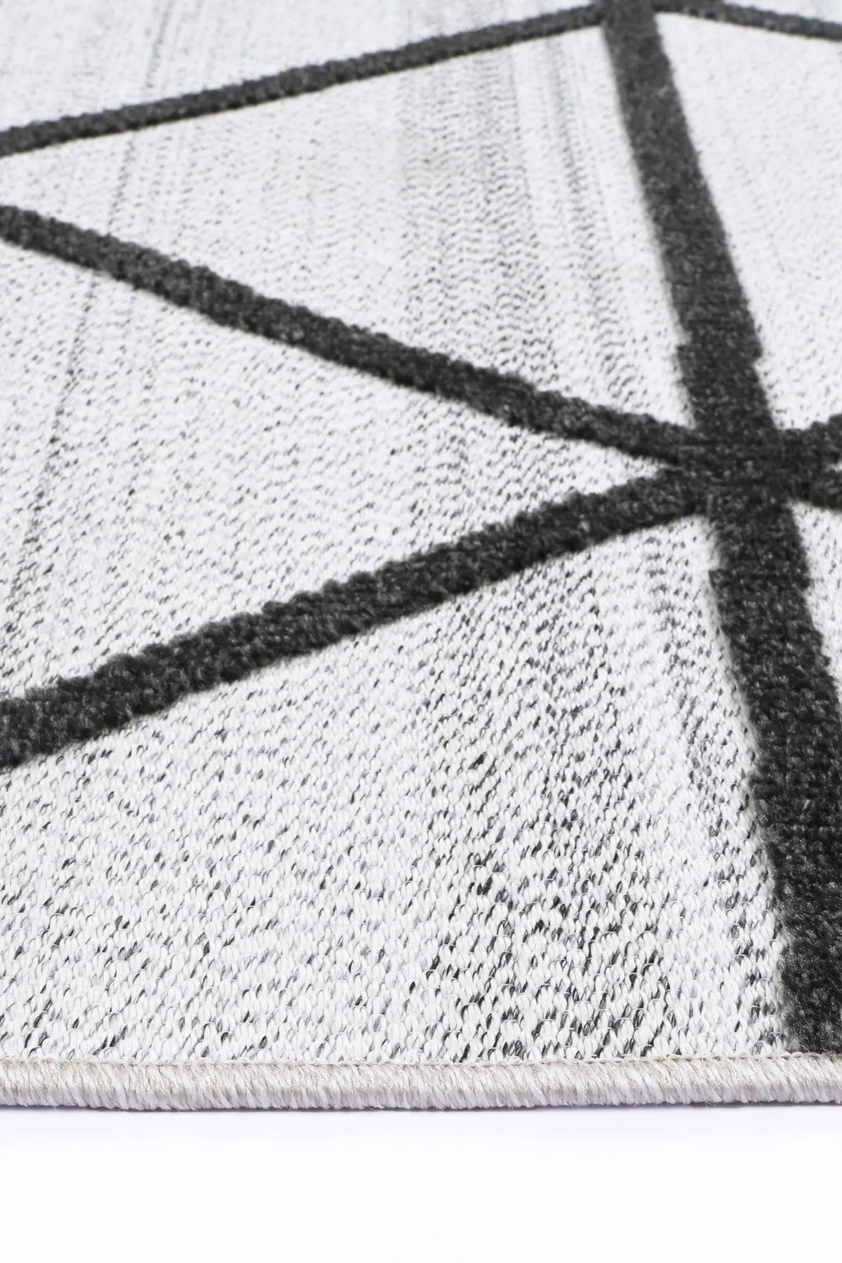 DETAIL | Aegean-Cream-Anthrasite-Diamond-Rug-BRAVEN-36155087.jpg