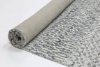 Le Canvas Kira — Grey tribal-geometric rug, pile texture