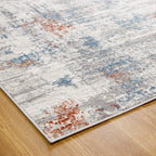 Le Canvas Neris — Grey multi rug, corner and edge detail