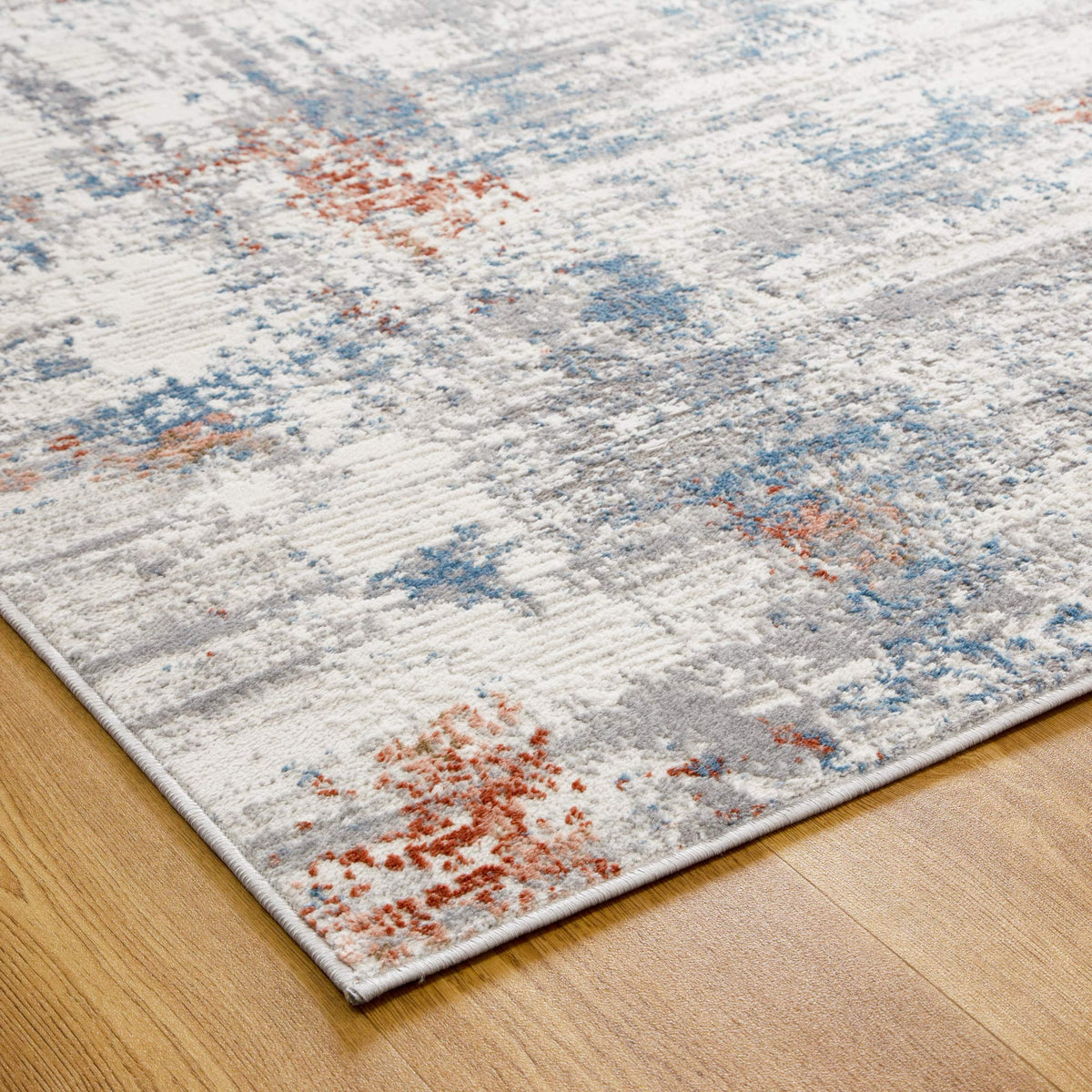 Le Canvas Neris — Grey multi rug, corner and edge detail
