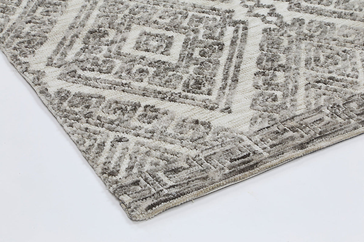Le Canvas Fara — Grey tribal rug, pile texture