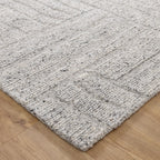 Le Canvas Arden — Grey rug, corner detail on timber floor