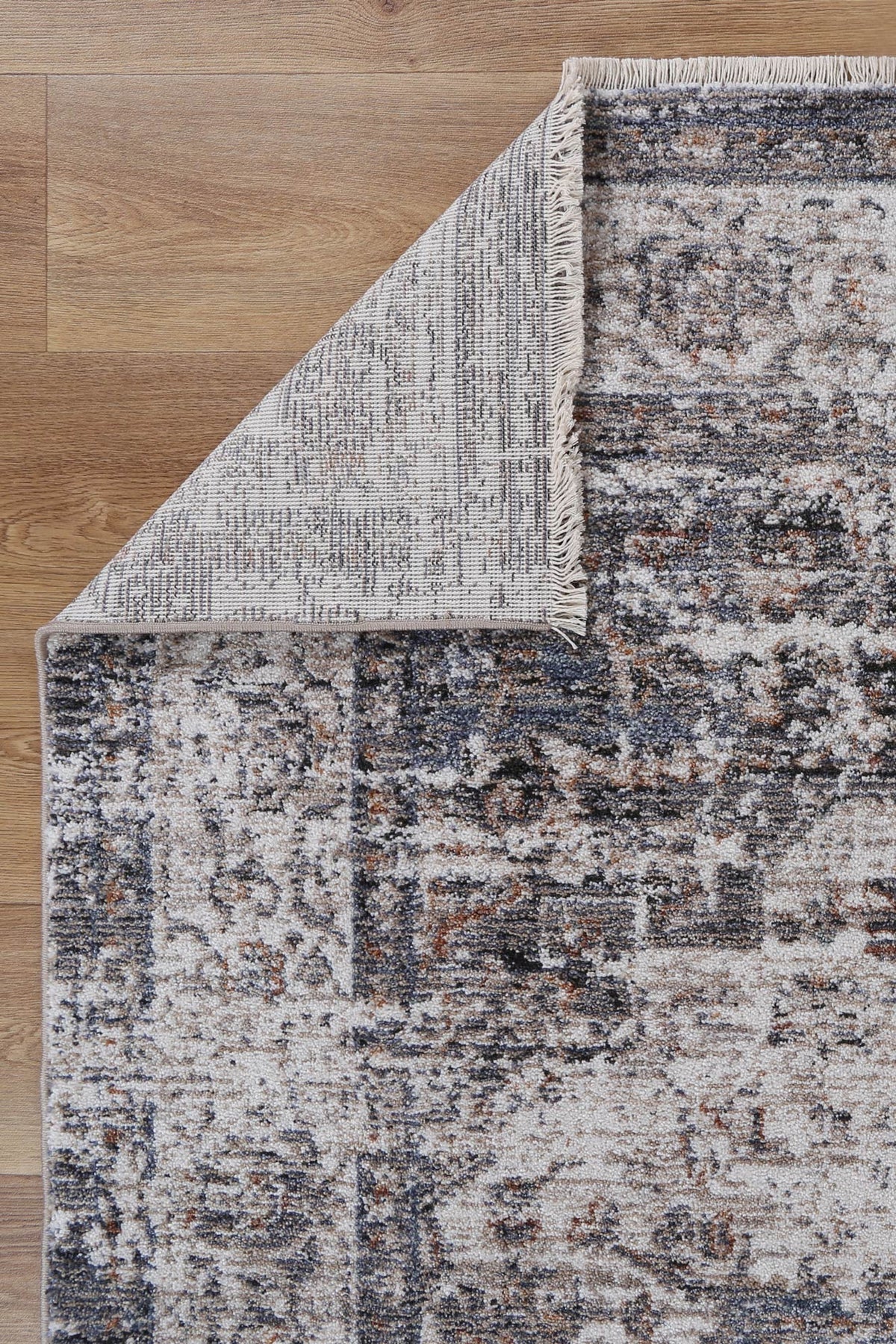 Le Canvas Soren — Ash rug, showing rug back weave and edge finish