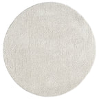 Le Canvas Tova — Sand round rug, top-down view
