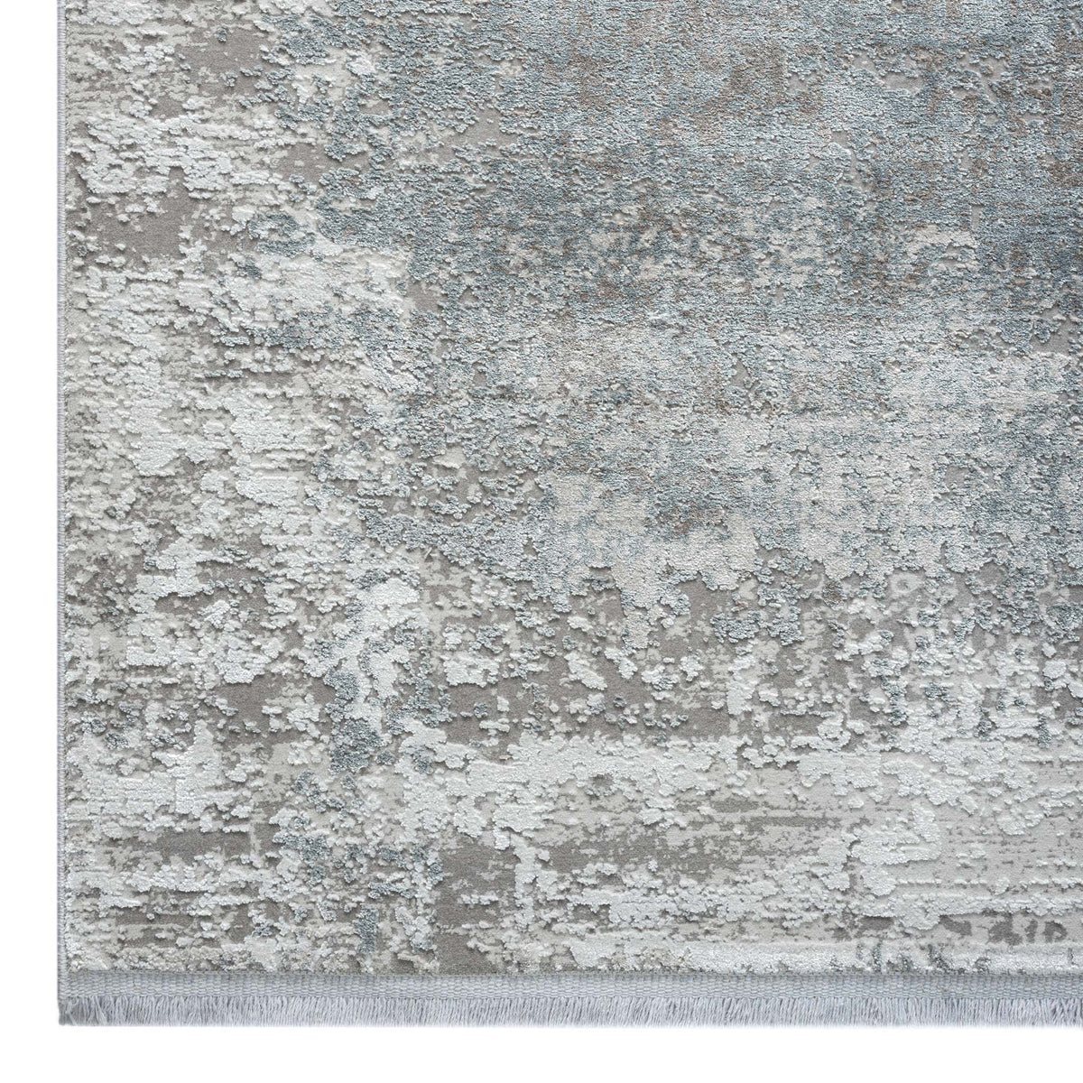 Le Canvas Dacre — Grey rug, corner and fringe detail