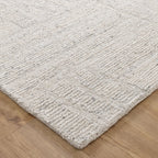 Le Canvas Lumen — Silver rug, corner and bound-edge detail on timber floor