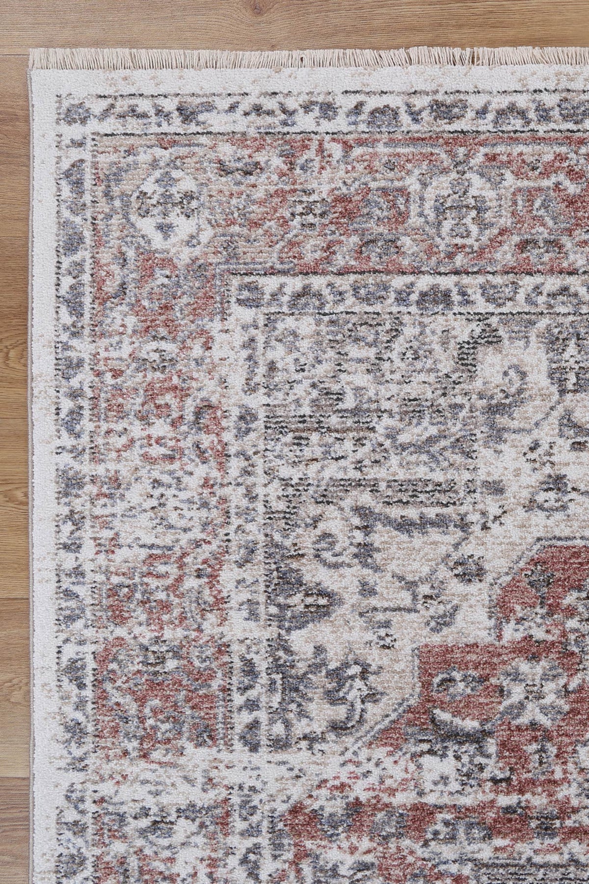 Le Canvas Otira — Multi rug, corner and fringe detail on timber floor