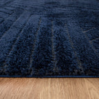 Le Canvas Cove — Navy rug, in-room view 2