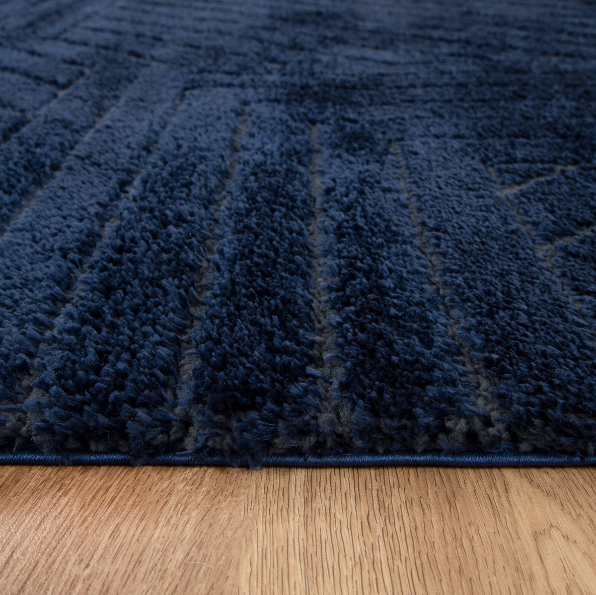 Le Canvas Cove — Navy rug, in-room view 2