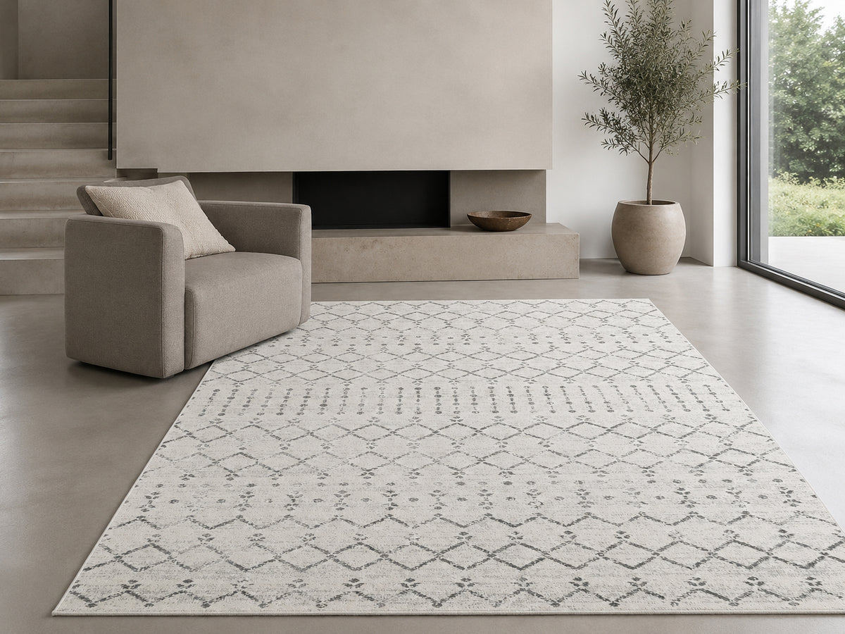 Le Canvas Elowen — Ivory and grey rug styled in a living room