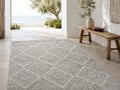 Le Canvas Fara — Grey rug styled in a living room