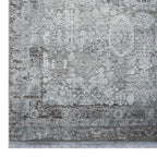 Le Canvas Halden — Grey rug, corner and fringe detail