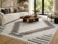 Le Canvas Ione — Stone and grey rug styled in a living room