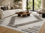 Le Canvas Ione — Stone and grey rug styled in a living room