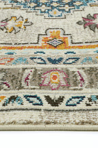 Le Canvas Isolde — Multi rug, corner and bound-edge detail