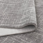 Le Canvas Marlow — Grey rug, showing rug back weave and edge finish