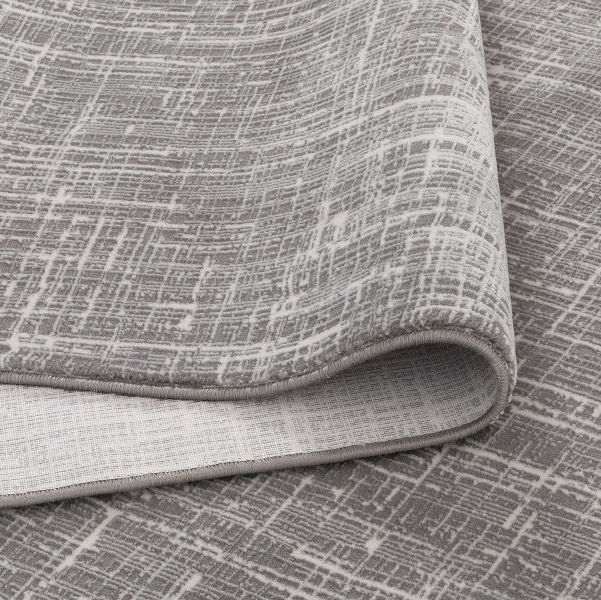 Le Canvas Marlow — Grey rug, showing rug back weave and edge finish