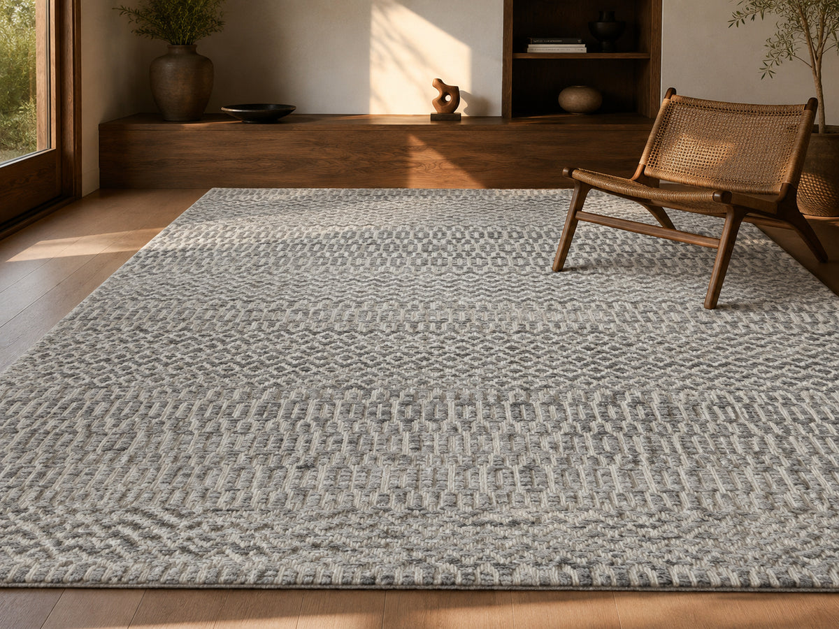 Le Canvas Kira — Grey rug styled in a living room