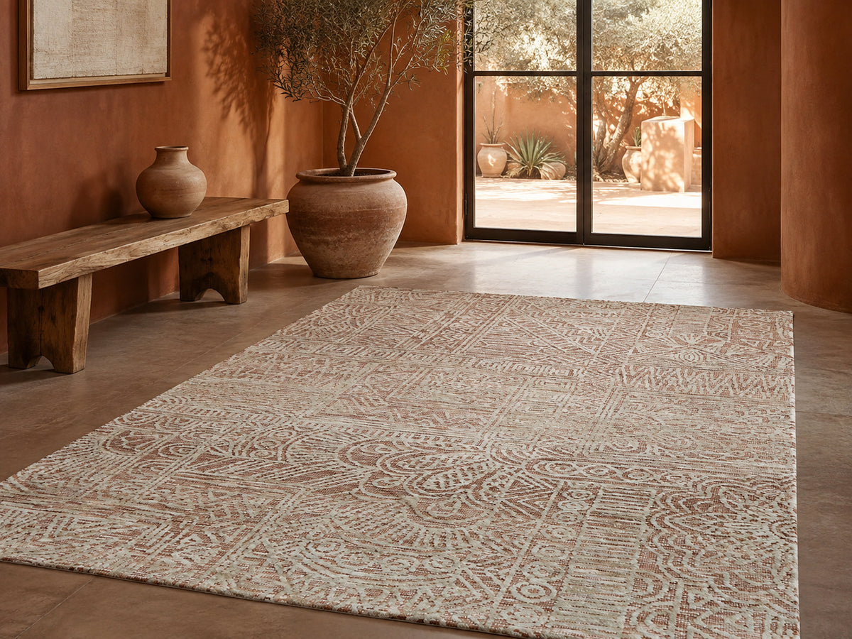 Le Canvas Taran — Rust rug styled in a living room