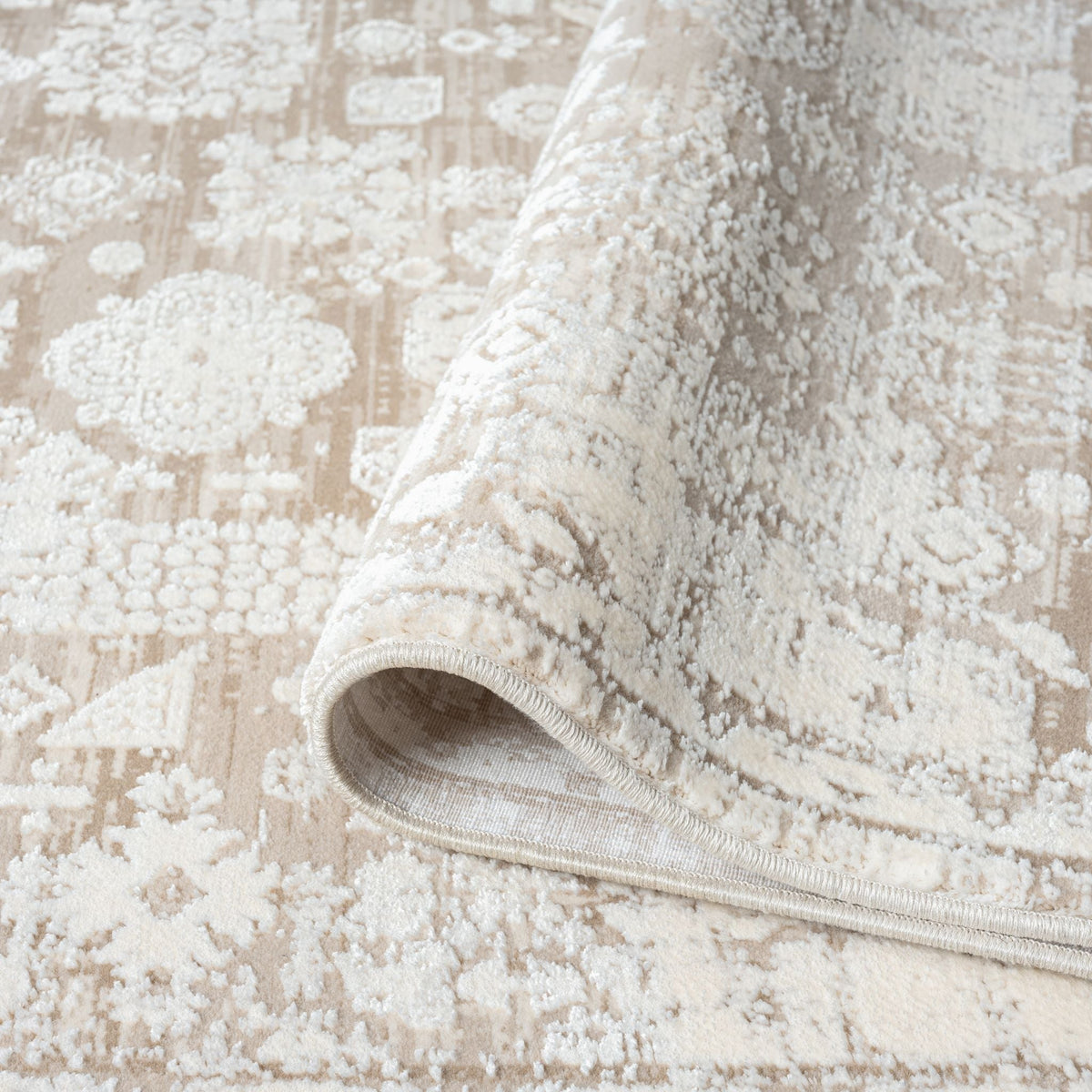 Le Canvas Alina — Cream rug, showing rug back weave and edge finish